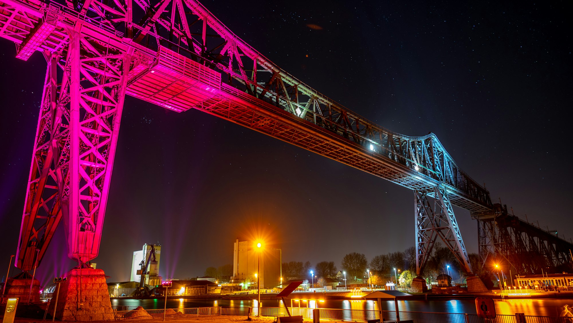 Tees Transporter Bridge under the colorful lights at night in Middlesbrough, United Kingdom